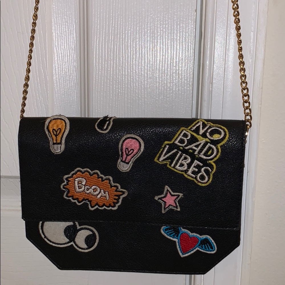 Black Crossbody Bag with Details and Gold Straps